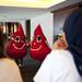 Costumed blood drops dance during the Be a Hero at the Big House blood drive on Sunday. Daniel Brenner I AnnArbor.com